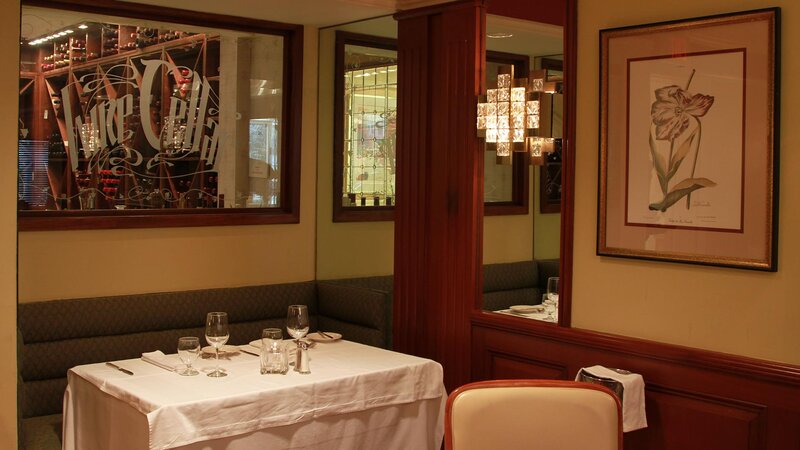 Dining room with booth seating for two